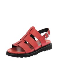 Sandalia de cuero roja con tiras cruzadas, diseño de punta abierta, hebilla ajustable en el tobillo y suela de goma negra con textura antideslizante.