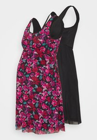 Conjunto de vestido de maternidade: um vestido com estampa floral em roxo, rosa e verde-água sobre fundo preto, e um vestido preto sólido. Ambos apresentam alças finas.