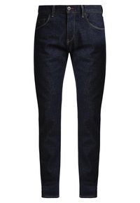 Dark blue denim jeans with a slim fit, featuring stitch detailing, front pockets, and a front button closure. Classic design with minimal embellishment.