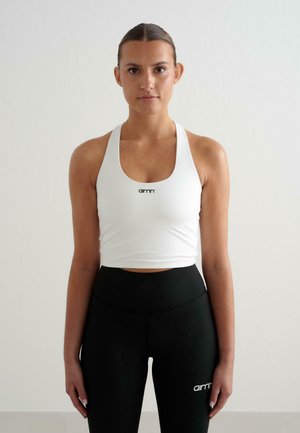CORE ESSENTIAL - Sportmelltartó intenzív sportoláshoz - white