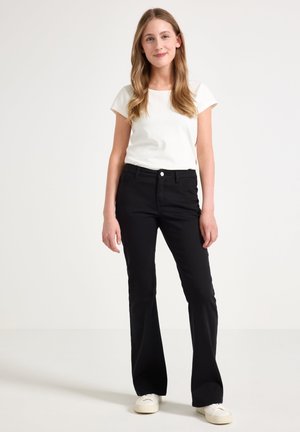 TROUSERS FREJA - Platėjantys džinsai - black
