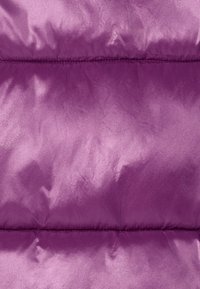 Purple padded fabric showing a smooth, shiny texture with horizontal quilted sections and a slight sheen. No visible hardware or patterns.
