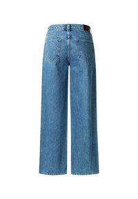 Jeans a gamba larga blu realizzati in denim, con vita alta, due tasche posteriori e un lavaggio sbiadito con orlo pulito. Etichetta in pelle marrone sulla vita.
