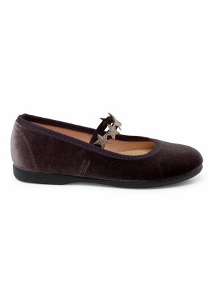 Velvet ballet flat in dark purple with a rounded toe, featuring a strap with star-shaped metallic accents and a black rubber sole.
