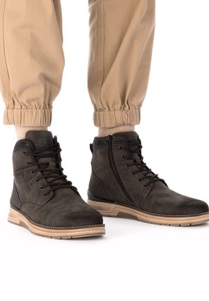 Rieker Bottines à lacets - grau