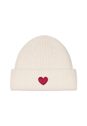 Cream-colored ribbed knit beanie with folded edge and a small embroidered red heart centered on the front.