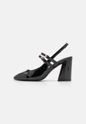 Højhælede pumps - black