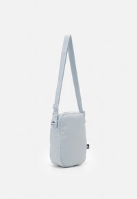 Nike Sportswear HERITAGE CROSSBODY UNISEX - Mala a tiracolo - aura/amethyst wave