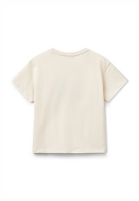 T-shirt a maniche corte, con scollo rotondo, in cotone beige chiaro, caratterizzato da un design semplice senza loghi o motivi visibili sul retro.