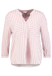 Maglietta a maniche lunghe rosa pallido con righe orizzontali bianche, scollatura a V e due tasche frontali. Tessuto morbido, orlo curvo, vestibilità rilassata.