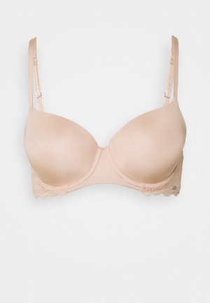 Gevoerd beha in lichtbeige met een gladde stof en kant langs de onderrand. Verstelbare bandjes met een haak- en oogsluiting aan de achterkant.