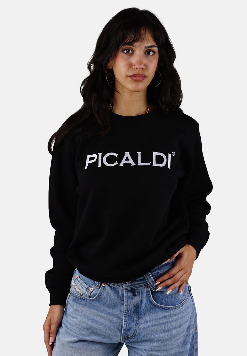 Black sweatshirt with embroidered "PICALDI" logo in white, featuring long sleeves and a relaxed fit, paired with light blue denim jeans.