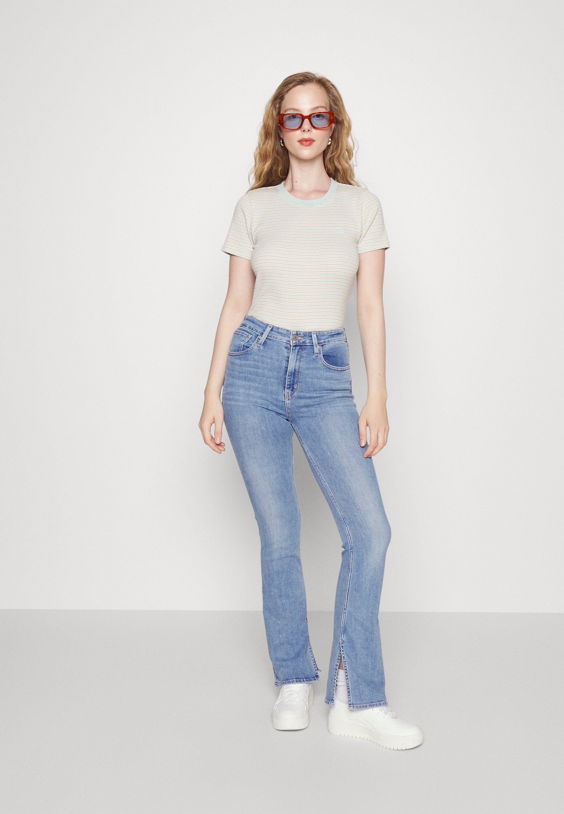 Levi's® 725™ HIGH RISE SLIT BOOTCUT - Flared Jeans - medium  indigo/lichtblauw - Zalando.nl