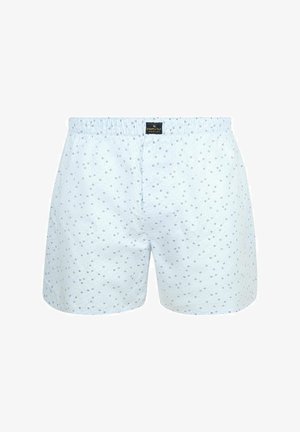 Lichtblauwe herenboxershorts met kleine donkerblauwe bloemenpatronen en een elastische tailleband met een zwart merklabel aan de voorkant in het midden.