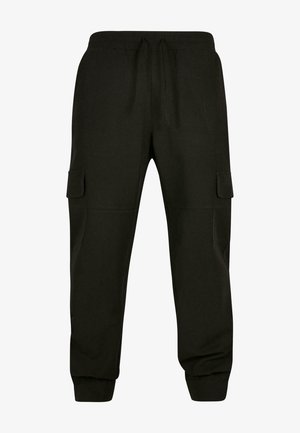 Schwarze Cargo-Hosen aus Baumwollmischung, mit Seitentaschen, elastischem Bund mit Kordelzug und gerippten Bündchen.