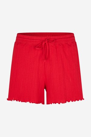 Shorts rossi a coste con vita elastica e dettaglio con coulisse. Rifiniti con un orlo a scalloped per un aspetto testurizzato.