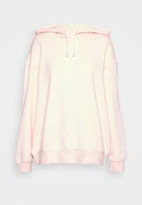 Sudadera oversized rosa claro con capucha ajustable, textura suave, mangas largas y puños acanalados. Presenta un pequeño logo en el pecho.
