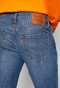 Levi's® 511 SLIM - Jeans straight leg - chanterelle cool