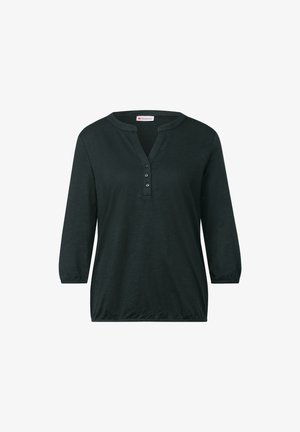 Dunkelgrünes, leichtes Langarmoberteil mit Henley-Ausschnitt, drei Knöpfen und gerafften Manschetten. Weicher Stoff mit lockerer Passform.