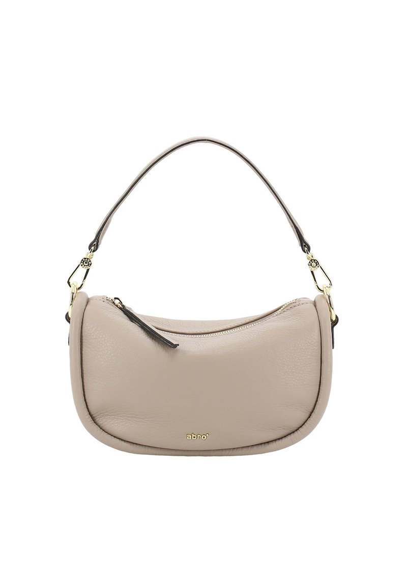 Beige Ledertasche mit geschwungener Form, kurzem Henkel, goldenem Reißverschluss und einer kleinen Lederquaste als Akzent. Logo auf der Vorderseite geprägt.