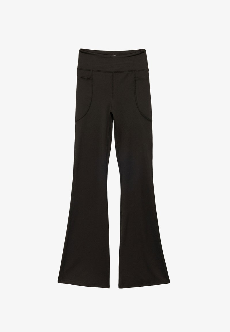 Zwarte omflair leggings van rekbaar materiaal, met een brede tailleband en twee voorzakken met gebogen naden. Gladde textuur.