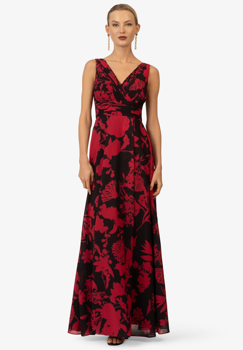 Schwarzes Maxikleid mit rotem Blumenmuster, mit V-Ausschnitt, gefälteltem Oberteil und fließendem Rock. Glattes Material mit dezentem Glanz.