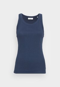 Navyblå ärmlös linne i bomull. Har en rund halsringning och en figursydd silhuett med en märkning på sidan.