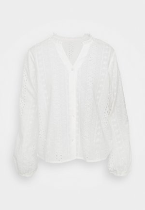 White long-sleeve blouse with floral eyelet embroidery, button-down front, round neckline, and slightly gathered cuffs.