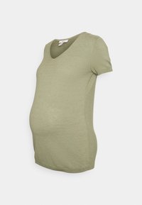 Camisola de maternidade com decote em V na cor verde-azeitona, textura canelada, mangas curtas, silhueta ajustada e tecido elástico para conforto.
