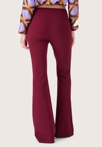 Camomilla Italia VICTORIAE Pantaloni red/rosso