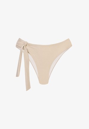 Beżowy dół bikini z wiązaniem z boku. Wykonany z błyszczącego, gładkiego materiału, ma klasyczny krój i jest w pełni podszewkowany.