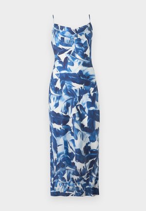 Abito lungo senza maniche con spalline sottili, caratterizzato da un motivo di foglie tropicali blu e bianche e una silhouette aderente.