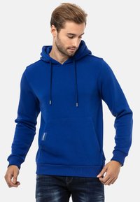 Royalblauer Hoodie aus Baumwollmischung mit einer Fronttasche, verstellbaren Zugbändern und gerippten Bündchen und Saum. Glatte Textur, lässiges Design.