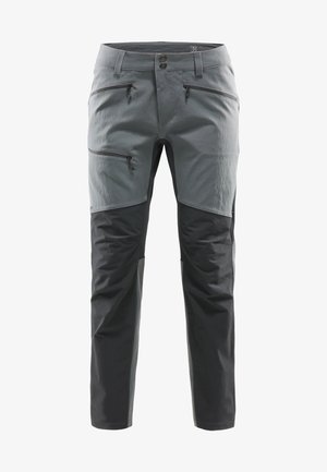 Herrenhose in zwei Farben mit Reißverschlusstaschen am Oberschenkel und an der Hüfte, Knopf- und Reißverschluss, für Outdoor-Aktivitäten entworfen.