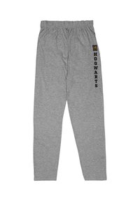 Graue Sweatpants mit einem elastischen Bund. Auf dem linken Bein ist "HOGWARTS" in Schwarz aufgedruckt, mit einem gelben Akzent in der Nähe der Oberkante.