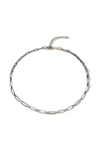 Sidabro spalvos metalinė grandinėlė choker, su pailgintais ryšiais. Yra reguliuojamas užsegimas ir grandinėlė, kurios ilgį galima keisti.