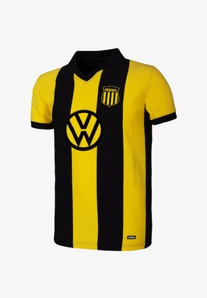 Zwart en geel gestreepte polo met een V-hals, met een cirkelvormig zwart Volkswagen-logo en een clubembleem op de linkerkant van de borst.