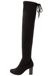 Botte noire en daim montant jusqu'à la cuisse, bout rond, surface texturée, découpes latérales et talon bloc. Elle est dotée d'un laçage en haut.