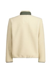 Giacca in pile color crema con superficie texture, caratterizzata da un colletto verde e una vestibilità leggermente squadrata. Nessuna chiusura o motivo visibile.