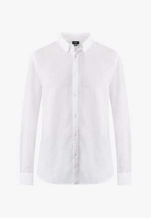 Biała, długa koszula z długim rękawem wykonana z lekkiego materiału. Posiada kołnierzyk zapinany na guziki i zaokrąglony dół z małymi guzikami z przodu.