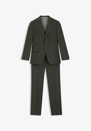 Abito verde scuro con tessuto strutturato, design sartoriale, giacca monopetto con due bottoni e pantaloni con frontale piatto.