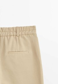 Massimo Dutti Spodnie materiałowe