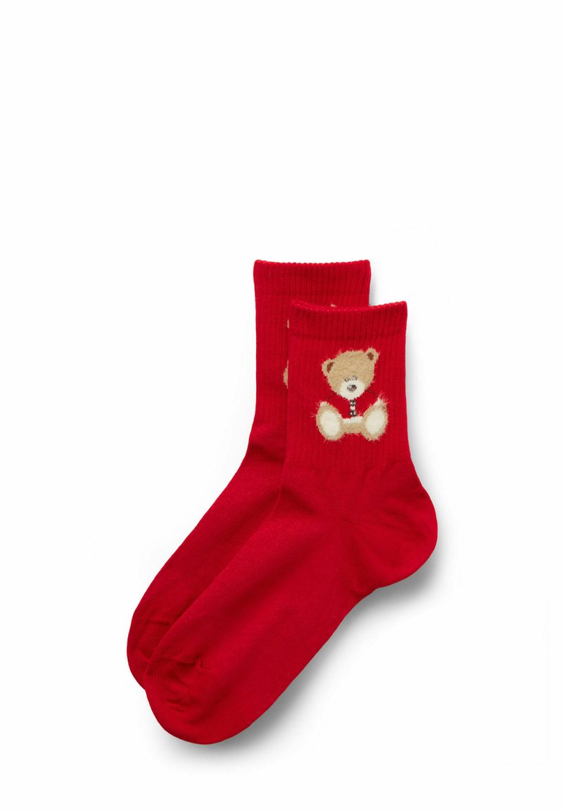 Red cotton socks featuring a knitted bear design on the front. Ribbed texture at the ankle; soft and comfortable.