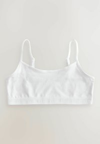 Bijela pamučna bralette s podesivim naramenicama, glatkom završnom obradom i elastičnom trakom s brendom na dnu. Jednostavan i minimalistički dizajn.