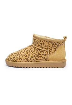 Ankle-high slipper boot with tan and brown leopard print fabric, shearling lining, and a flat rubber sole with a pull tab at the heel.