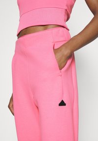 adidas Sportswear Träningsbyxor - pink