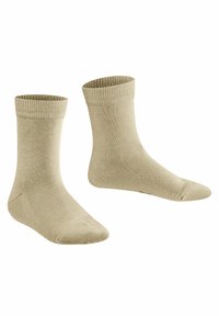 Calcetines tobilleros beige con puño acanalado, hechos de material suave, que presentan una textura lisa y una puntera reforzada para mayor durabilidad.