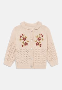 Vaaleanbeige neulecardigan, jossa on burgundin ja vihreänväristä kukkakirjontaa. Kappaleessa on pyöreä kaulus ja viisi napitusta. Silkkilaskoskuvio.