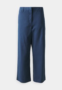 Pantaloni blu a gamba larga realizzati in cotone, con tasca anteriore, vita ben definita e linee pulite, con una finitura texturizzata.
