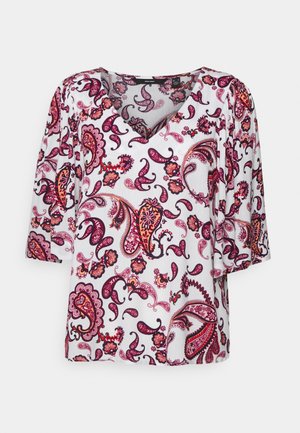 Blusa branca com decote em V profundo, mangas três quartos e padrão paisley em tons de rosa, roxo e laranja. Tecido leve com textura suave.